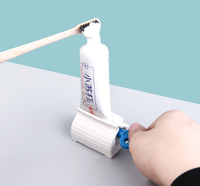 Manual toothpaste dispenser (1 pc.)