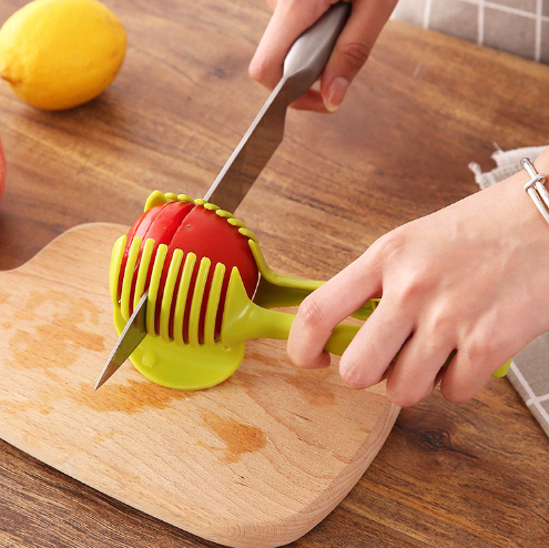 Fruit and vegetable slicing holder