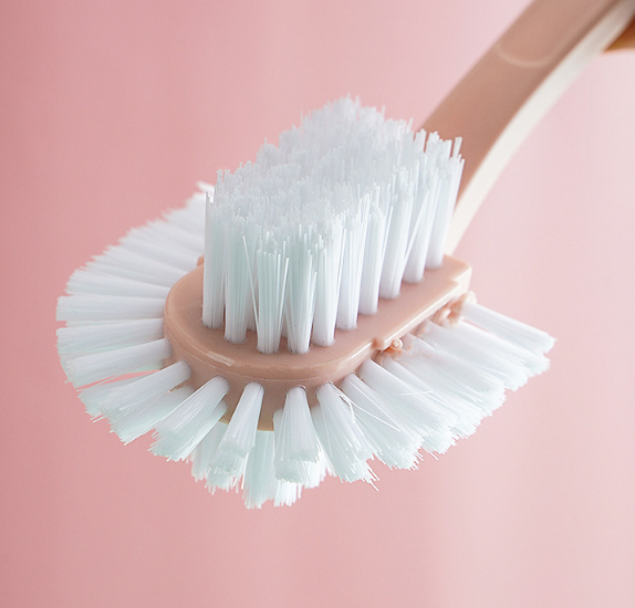 Universal brush for cleaning surfaces