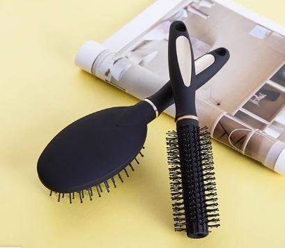 Brushing comb for hair styling