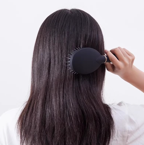 Massage comb for hair styling