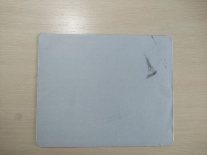 Rubberized Mouse Pad, DAMAGE