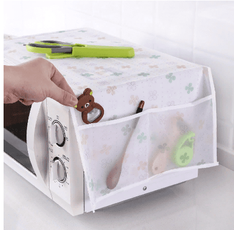 Microwave oven cover with pockets