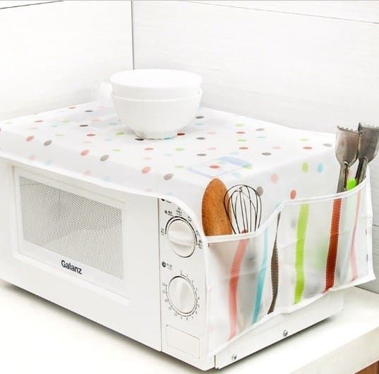 Microwave oven cover with pockets