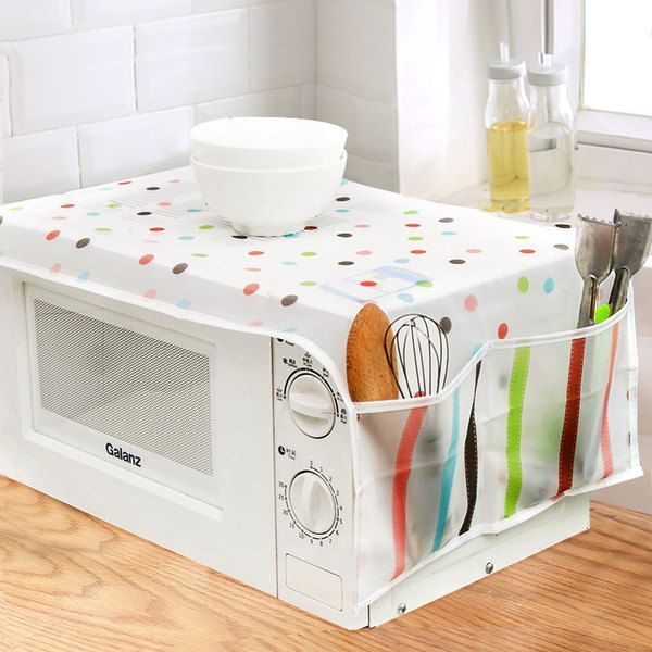 Microwave oven cover with pockets