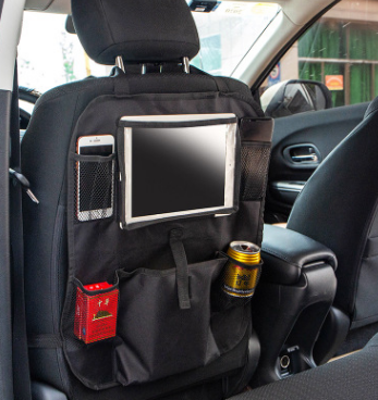 Backrest organizer with a compartment for a tablet