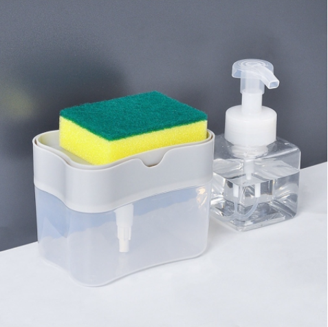 Detergent dispenser with sponge