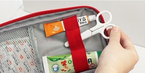 Large, red first aid kit