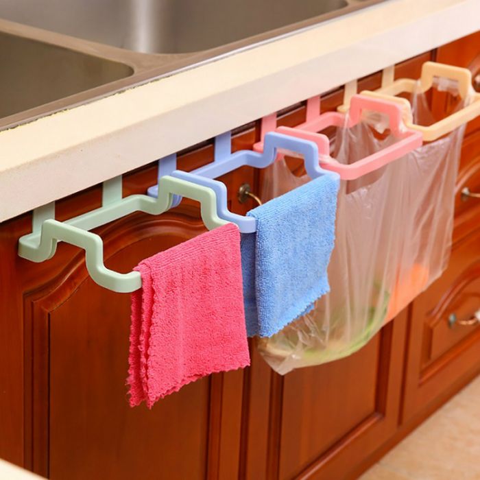 Garbage bag holder for kitchen with fixing on the door