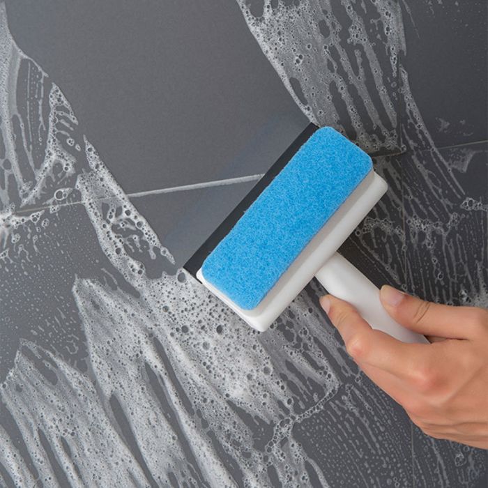 Double-sided glass and mirror cleaner with waterspout, abrasive sponge and plastic handle