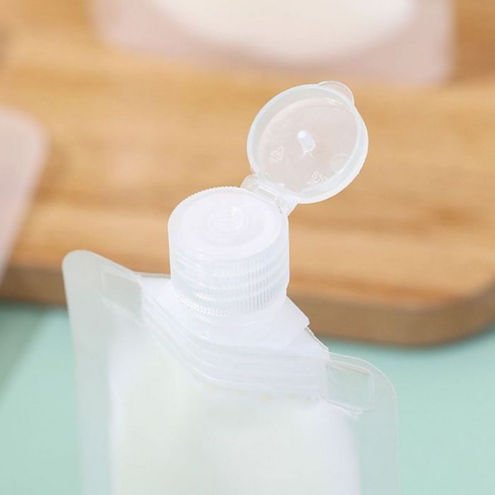 Reusable doy-pak bottle 50 ml with a dispenser cap, transparent