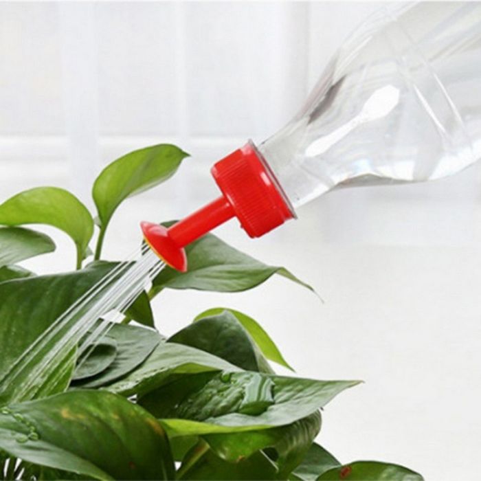 Plastic bottle cap for watering flowers