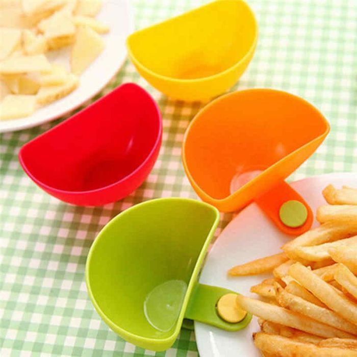 Mini gravy tray on a clothespin for attaching to a plate made of food plastic