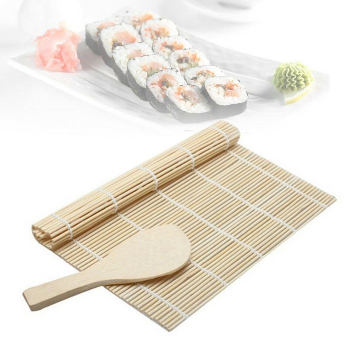 Set for making rolls: bamboo mat and rice spoon