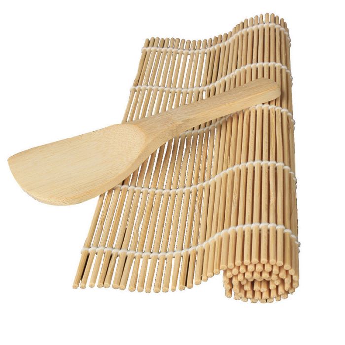 Set for making rolls: bamboo mat and rice spoon