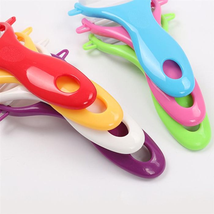 Ceramic vegetable peeler with plastic handle