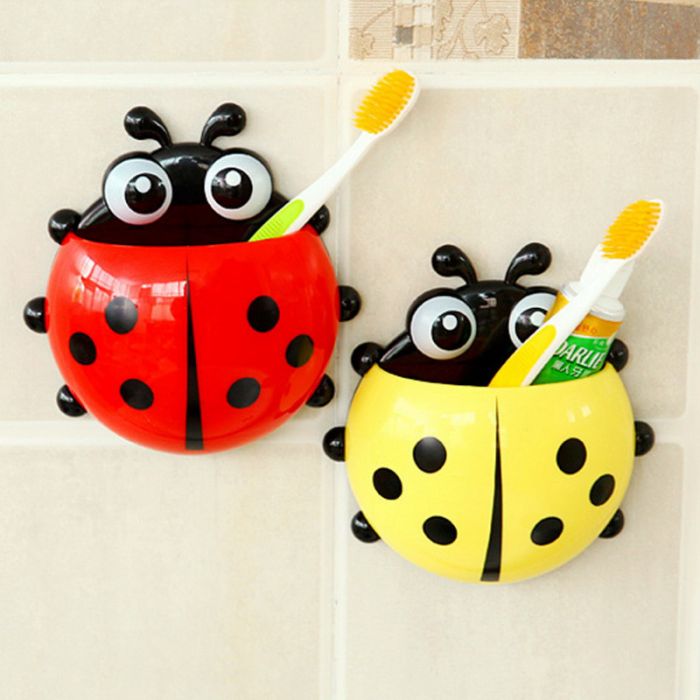 Shelf-penisal in the bathroom ТLadybugУ on suction cups for toothbrushes and toothpastes.