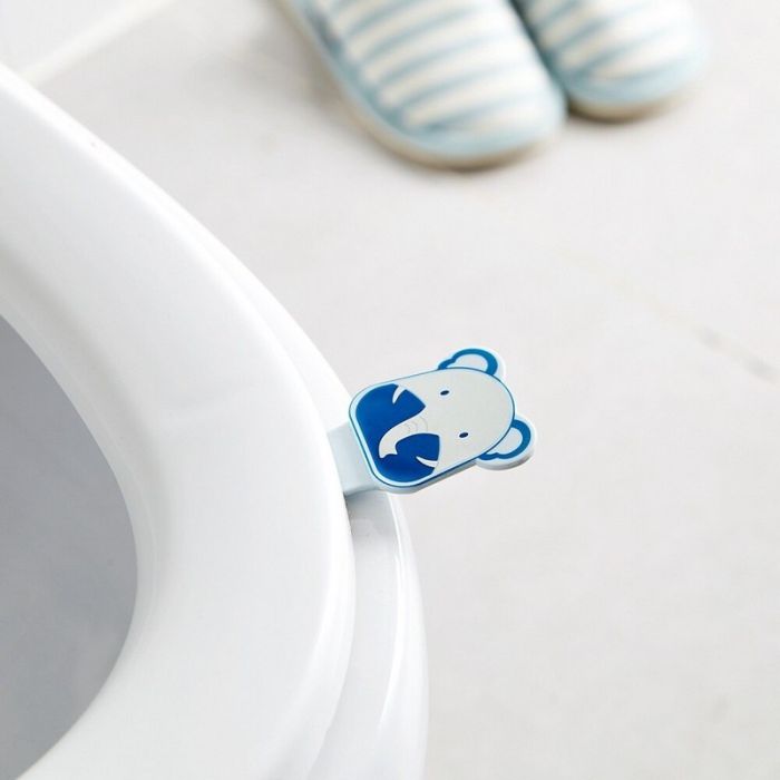 Self-adhesive plastic toilet seat handle