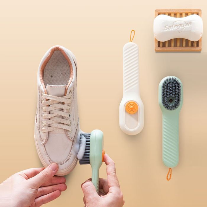 Shoe and clothes brush with soap dispenser, long handle, colors in assortment