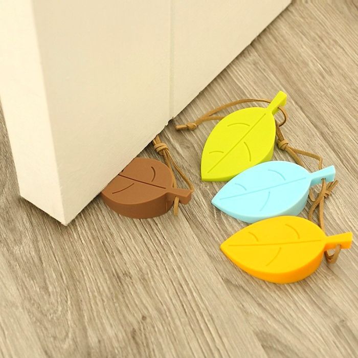 Door stopper ТLeafУ silicone with a cord