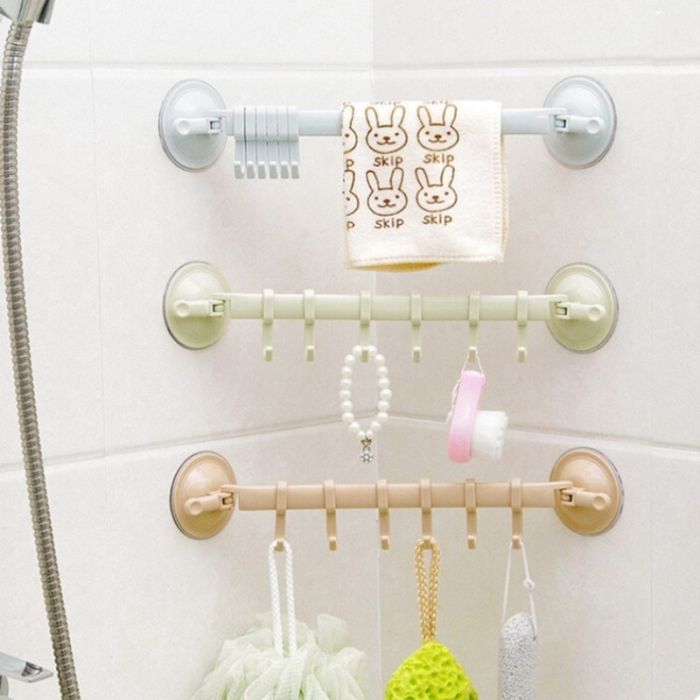 Plastic coat rack with suction cup hooks