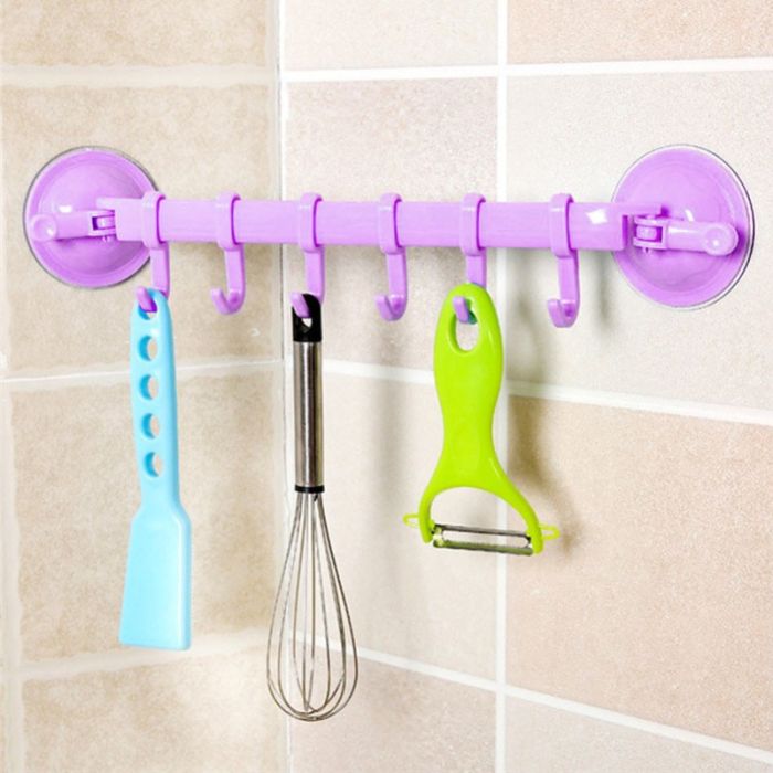 Plastic coat rack with suction cup hooks